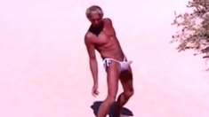 Tanned Guy On Beach In Tiny String Thong (temporarily!)