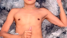 Skinny asian ladyboy masturbates on cam