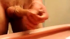 Solo male wanks and cums with lots of precum