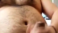 Fat Bear Jacks Off During a Massage