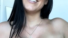 Busty curly brunette with big boobs fucks on couch