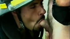 The horny fireman shows the gay cop how to put out a pecker fire