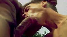 Two insatiable guys get into some dick-working action outdoors