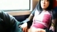 Asian Milf Rubs Her Clit On A Train.